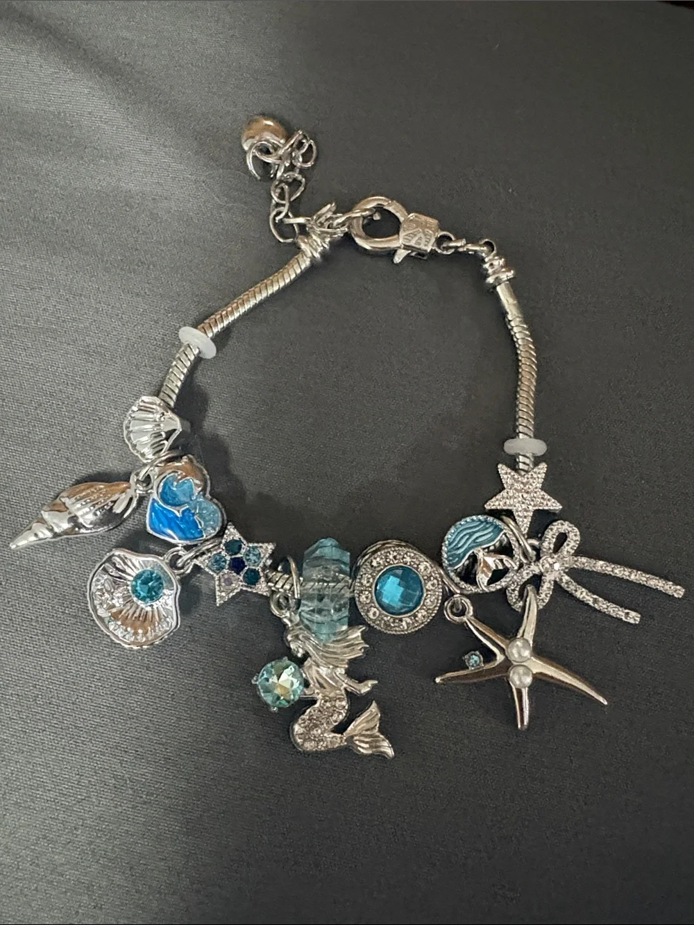 Silver Sea Charm Bracelet with Blue Accents